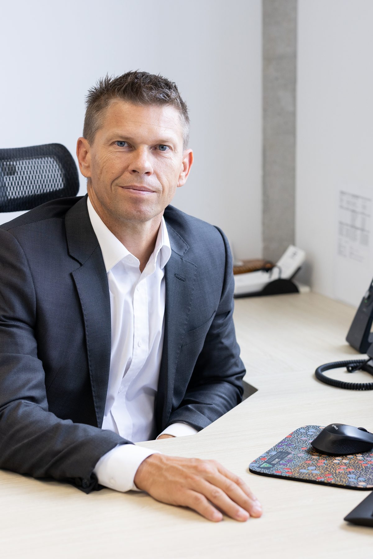 Partner Simon Bennett at his desk in OMB’s Southport office
