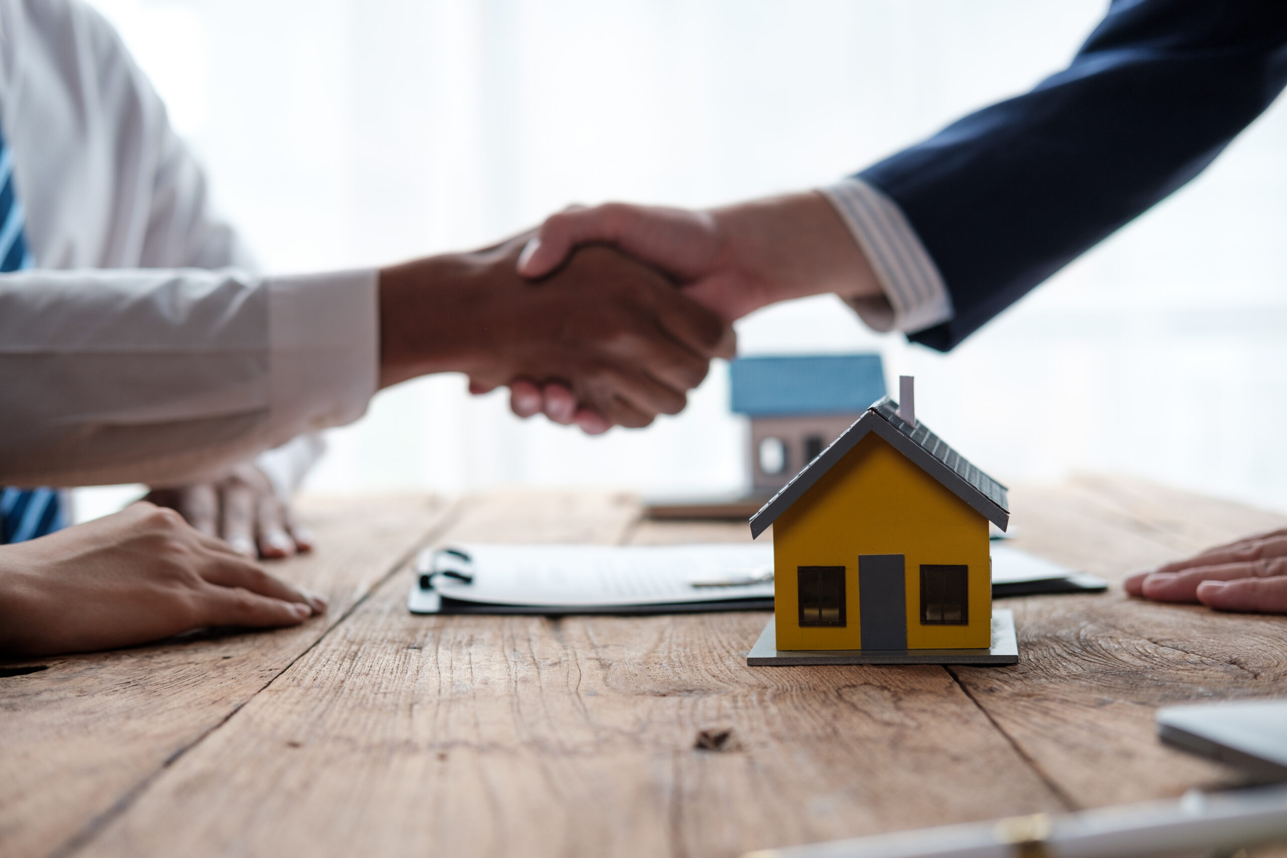 residential house businessman banker shake hand wi 2026 03 16 23 02 17 utc